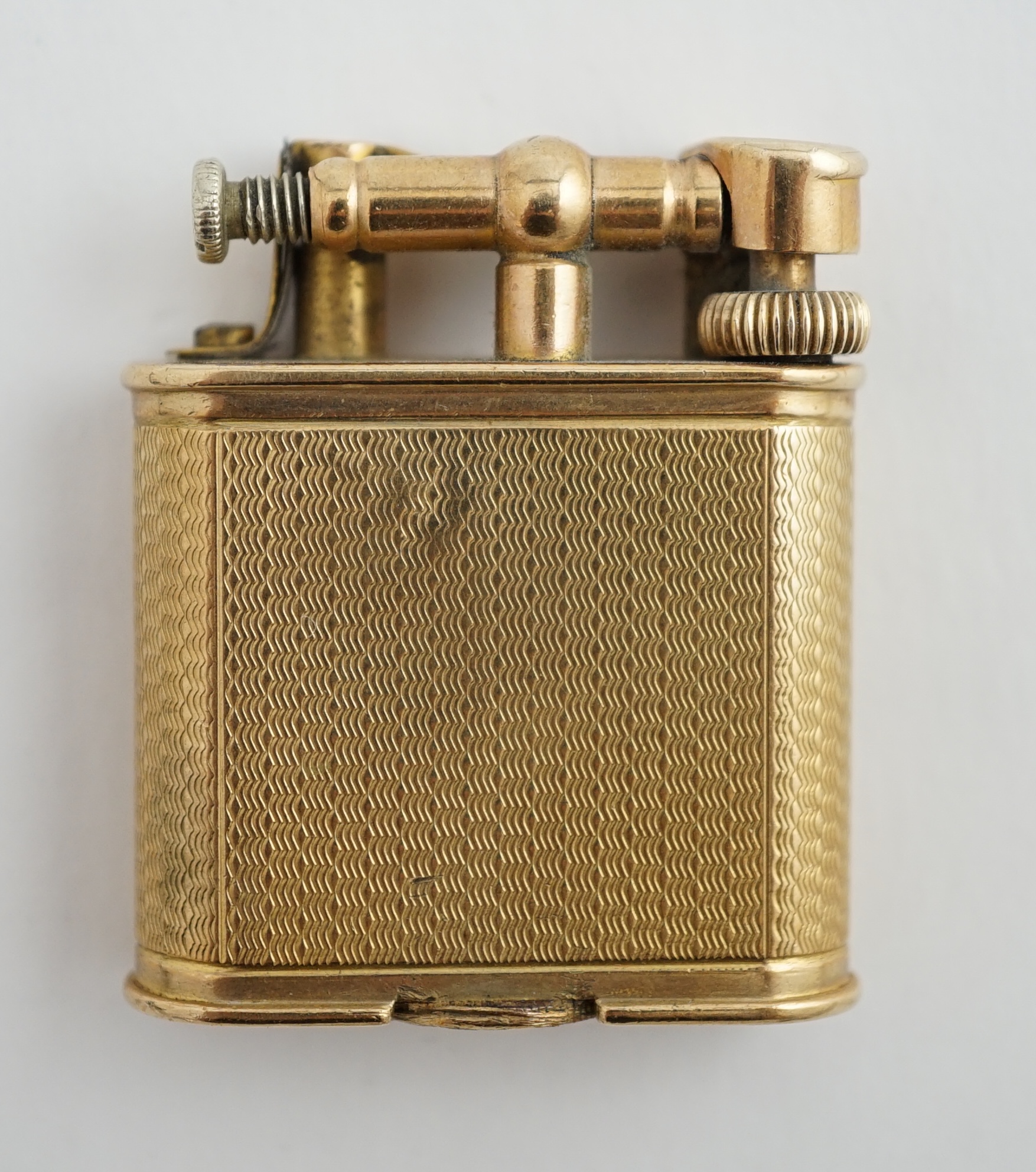 A George V engine turned 9ct gold cased Dunhill lighter